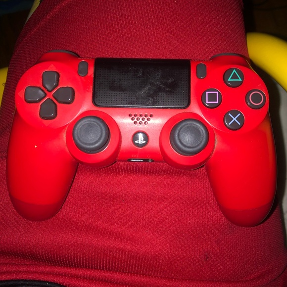 Sony PlayStation 4 Console with Red and Blue Controllers